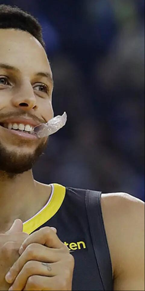 Stephen Curry #30 of the Golden State Warriors reacts to the crowd chanting 'MVP' during their game against the Washington Wizards at ORACLE Arena on October 24, 2018 in Oakland, California. Curry finished the game with 51 points.