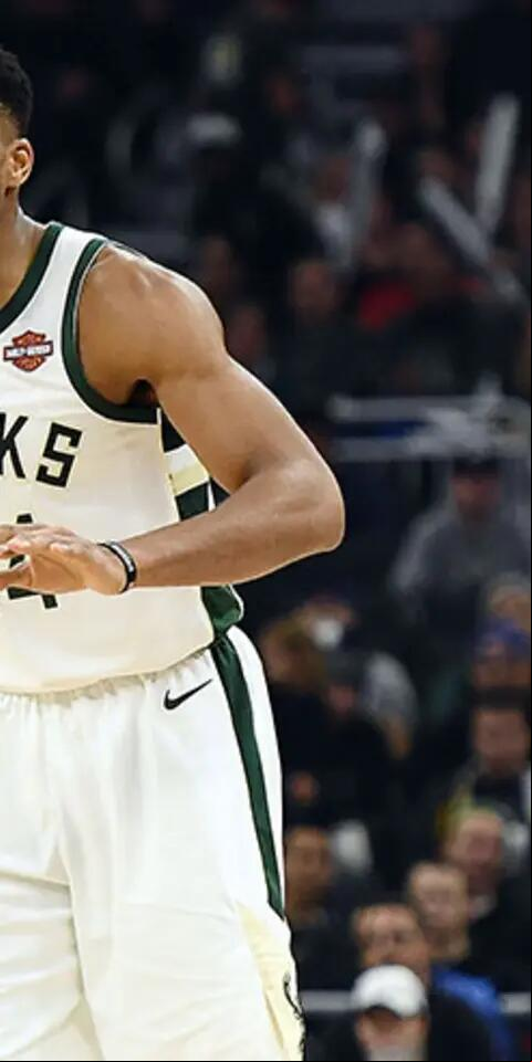 Giannis Antetokounmpo #34 of the Milwaukee Bucks handles the ball during a game against the Sacramento Kings at the Fiserv Forum on November 4, 2018 in Milwaukee, Wisconsin