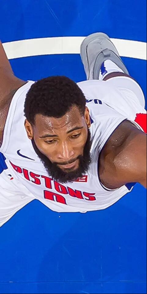 Andre Drummond #0 of the Detroit Pistons grabs the rebound against the Washington Wizards in the second half of an NBA game at Little Caesars Arena on December 26, 2018 in Detroit, Michigan.